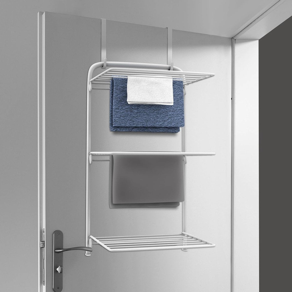 Practical white door airer for space-saving clothes drying rack, 3 fold-out wings with 11 metres of clothes line offer plenty of room for textiles