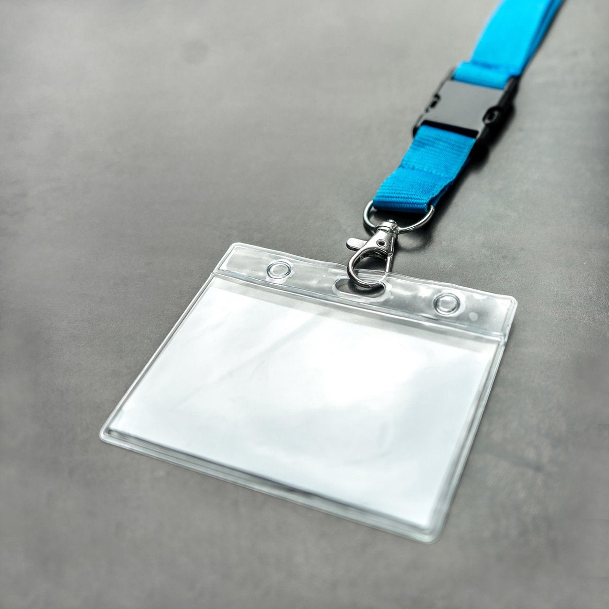 Blue lanyard with badge/pass holder, per 50 pieces