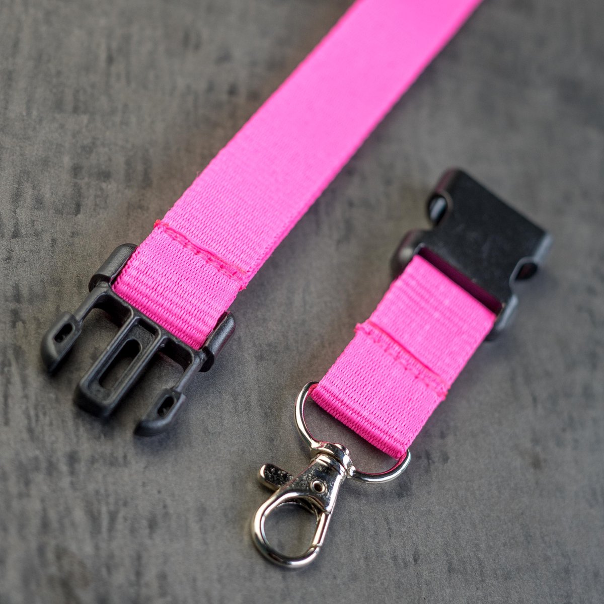 Pink lanyard with badge/pass holder, per 50 pieces