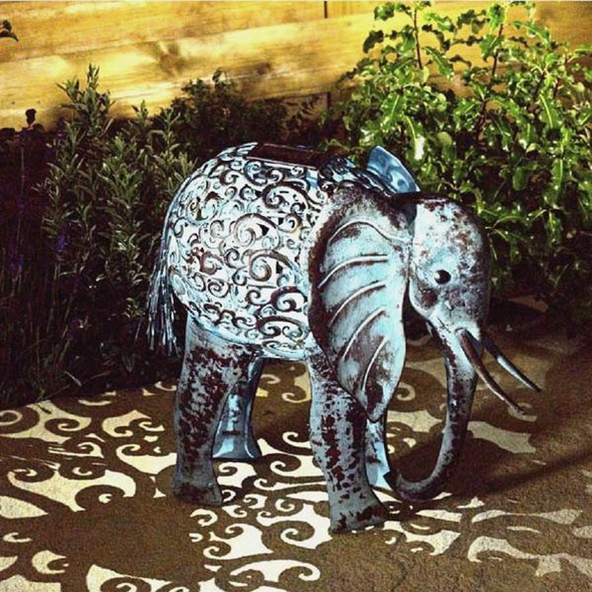 Solar-powered elephant with lights
