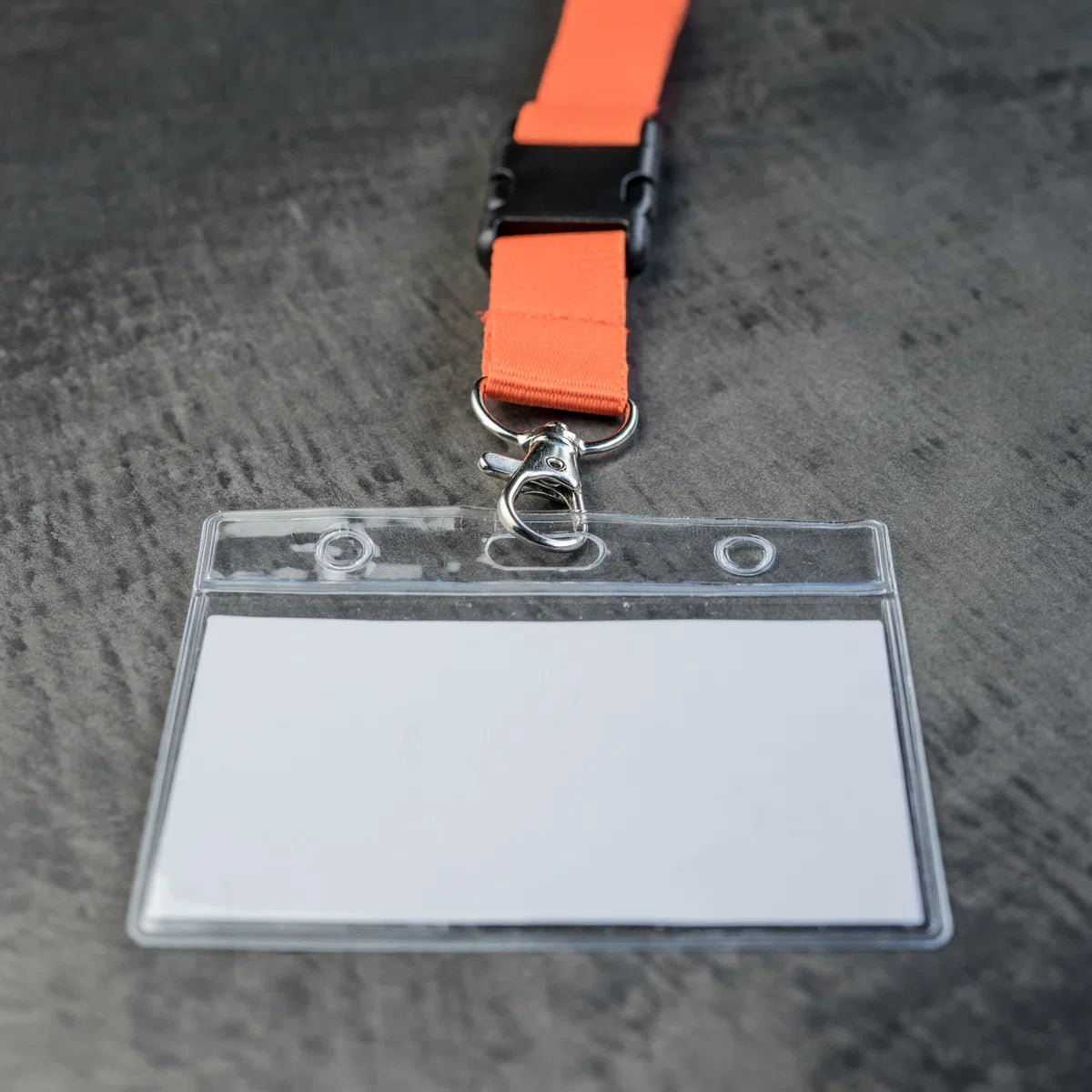 Orange lanyard with badge/pass holder, per 50 pieces