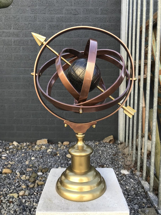 Sundial with earth as a centerpiece, on a base
